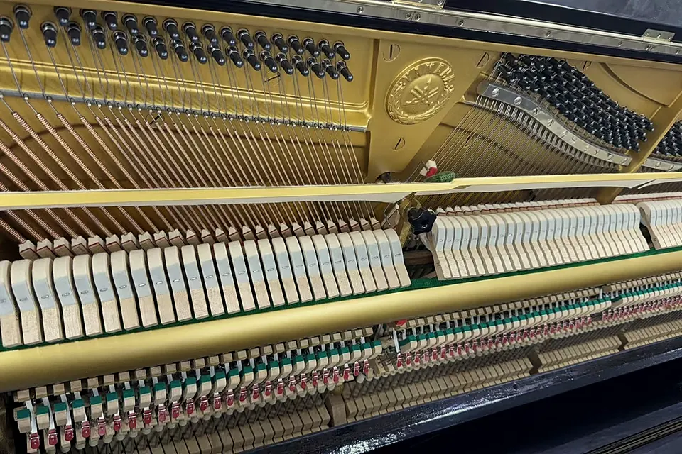 Hammers, strings and tuning pins inside a Yamaha U3H
