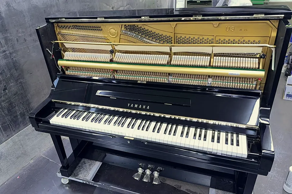 Yamaha U3H with the top lid and front panel open, showing the action